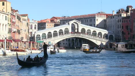 Gondolas-under-the-Rialto-Bridge-in-Venice-Italy-1