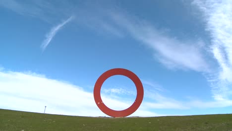 A-sculpture-of-the-letter-o-against-an-open-sky