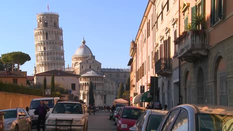 A-street-in-Pisa-Italy-with-the-leaning-tower-in-background