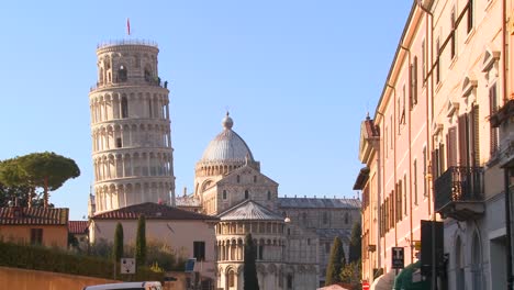 A-street-in-Pisa-Italy-with-the-leaning-tower-in-background-2