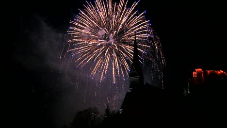 A-magnificent-fireworks-display-behind-a-church
