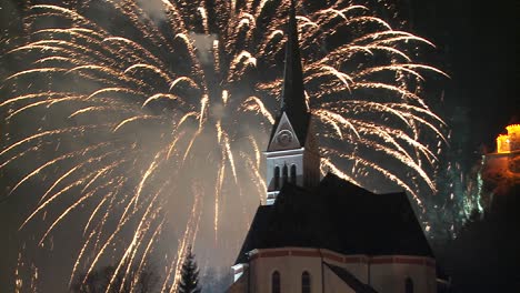 A-magnificent-fireworks-display-behind-a-church-1