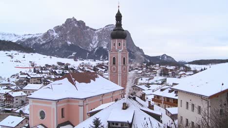 A-church-in-a-snowbound-Tyrolean-village-in-the-Alps-in-Austria-Switzerland-Italy-Slovenia-or-an-Eastern-European-country