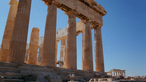 Low-angle-shot-of-the-columns-of-the-Acropolis-and-Parthenon-on-the-hilltop-in-Athens-Greece-1