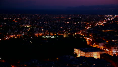 Beautiful-establishing-panning-shot-of-Athens-Greece-and-the-Acropolis-at-dusk-or-night