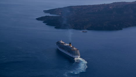 The-Costa-Concordia-cruise-ship-sails-close-to-an-island
