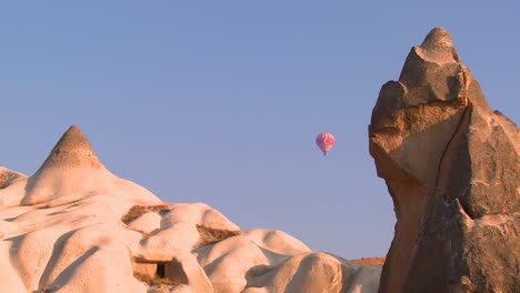 Hot-air-balloons-fly-over-the-magnificent-geological-formations-of-Cappadocia-Turkey-3