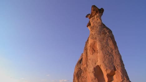 Bizarre-geological-formations-looks-like-a-cowboy-wearing-a-hat-at-Cappadocia-Turkey