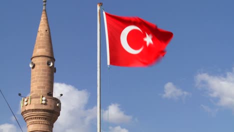 A-Turkish-flag-flies-near-a-mosque