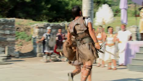 Costumed-actors-reenact-a-Greek-or-Roman-hand-to-hand-combat-fight