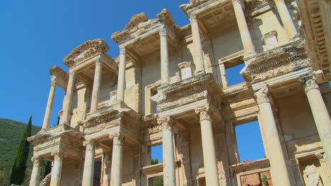 Low-angle-view-of-an-ancient-facade-at-Ephesus-Turkey