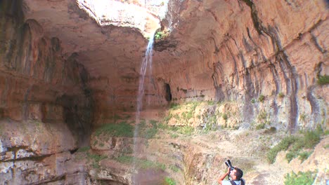 A-photographer-takes-pictures-in-a-cave-in-Lebanon-1