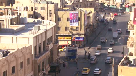 Slow-tilt-up-of-high-angle-morning-skyline-view-of-Amman-Jordan