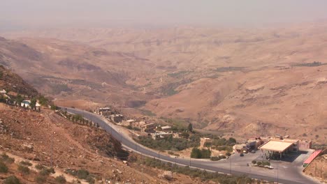 A-wide-angle-shot-of-a-highway-or-road-leading-to-the-Dead-Sea-in-Jordan
