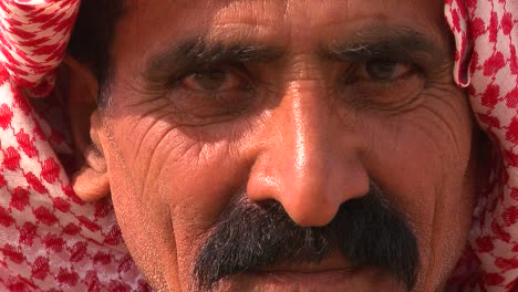 Close-up-of-a-face-of-a-Palestinian-Bedouin-man-in-headscarf