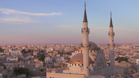 Beautiful-generic-wide-shot-of-a-mosque-towering-above-the-Arab-city-of-Madaba-in-Jordan-1