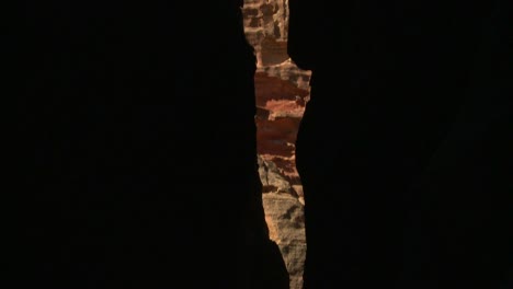 View-of-the-facade-of-the-Treasury-building-in-the-ancient-Nabatean-ruins-of-Petra-Jordan-through-the-narrow-canyon-entrance-1