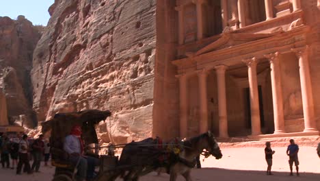 Camels-and-tourists-in-front-of-the-facade-of-the-Treasury-building-in-the-ancient-Nabatean-ruins-of-Petra-Jordan