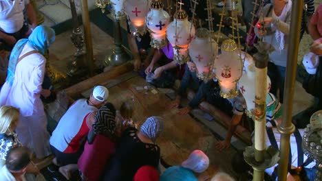 High-angle-over-the-holy-stone-which-marks-the-sport-Jesus-was-taken-down-from-the-cross-in-the-Holy-Sepulcher-in-Jerusalem-Israel-1