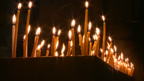 Candles-burn-in-rows-in-a-church-in-the-heart-of-Jerusalem