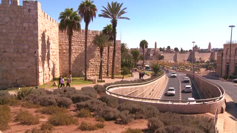 Traffic-moves-near-the-old-city-walls-of-Jerusalem-Israel-1