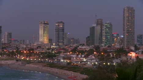 Modern-buildings-of-Tel-Aviv-Israel-at-night-with-beach-and-ocean-nearby-1