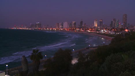 Modern-buildings-of-Tel-Aviv-Israel-at-night-with-beach-and-ocean-nearby-2