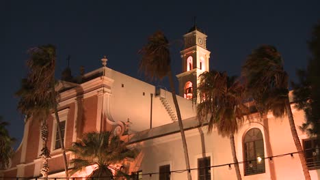 The-mosque-at-Jaffa-near-Tel-Aviv-Israel-at-night-with-palm-trees-blowing
