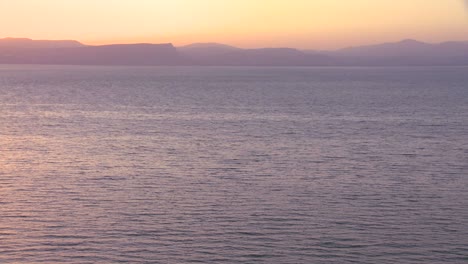 Pan-across-as-dusk-sets-over-the-Sea-Of-Galilee-in-Israel