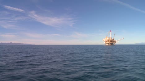 An-oil-platform-off-the-coast-of-Santa-Barbara-California-as-seen-from-a-boat-passing-nearby