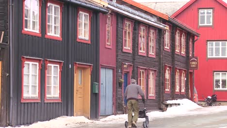 Wooden-buildings-line-the-streets-of-the-old-historic-mining-town-of-Roros-in-Norway-1
