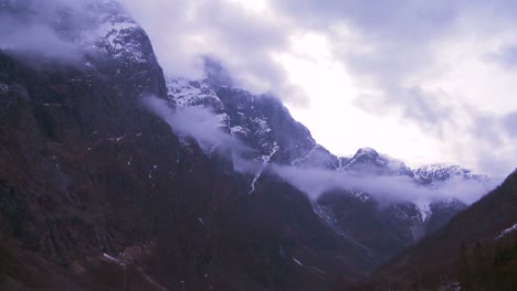 Time-lapse-of-clouds-and-fog-moving-across-a-fjord-in-Norway