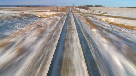 Time-lapse-POV-from-the-front-of-a-train-passing-through-a-snowy-landscape-1