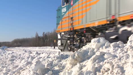A-VIA-rail-Canada-passenger-train-passes-in-the-snow-1