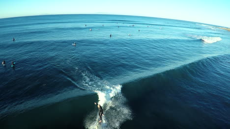 An-aerial-shot-of-a-surfer-riding-the-waves