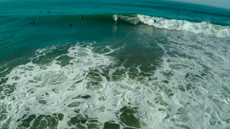 Aerials-over-surfers-riding-waves-on-a-Southern-California-beach-4