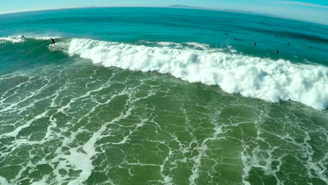 Aerials-over-surfers-riding-waves-on-a-Southern-California-beach-5