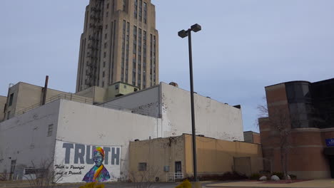 A-mural-says-Truth-on-a-wall-beneath-a-tall-downtown-building-in-Battle-Creek-Michigan