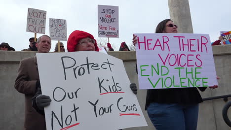 Protestors-hold-signs-against-gun-violence-in-schools-during-the-March-For-Our-Lives-Protest-1