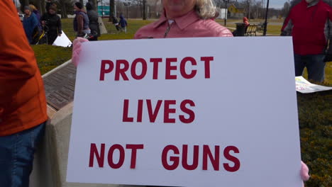 Protestors-hold-signs-against-gun-violence-in-schools-during-the-March-For-Our-Lives-Protest-2