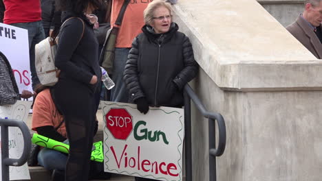 Protestors-hold-signs-against-gun-violence-in-schools-during-the-March-For-Our-Lives-Protest-5
