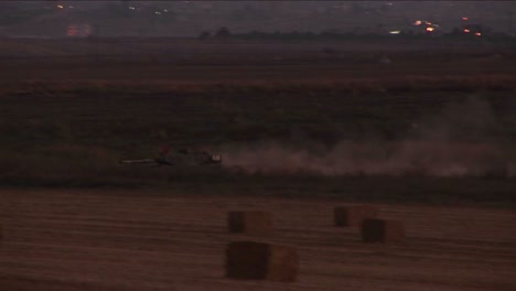 An-Israeli-tank-moves-through-a-no-man's-land-on-the-border-of-Israel-and-the-Gaza-Strip