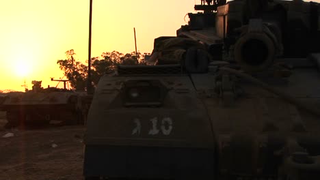 An-Israeli-tank-is-silhouetted-against-a-multi-colored-sky-1