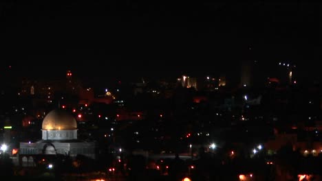 The-Dome-of-the-Rock-in-Jerusalem-is-illuminated-by-city-lights