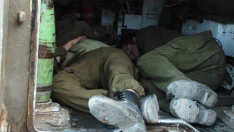 Israeli-army-officers-get-some-rest-in-the-back-of-a-tank-during-the-Israel--Lebanon-war