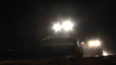 Armored-Israeli-bulldozers-move-along-the-Gaza-Strip-border-in-a-night-patrol-operation