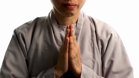 A-young-Buddhist-monk-prays-3