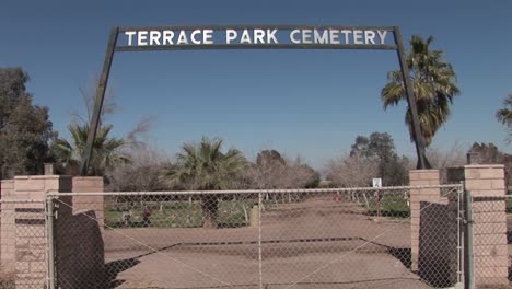 The-entrance-gates-to-a-cemetery-are-closed