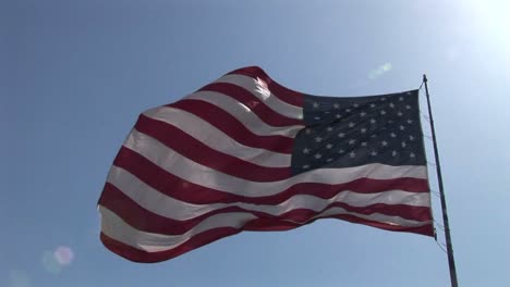 An-American-flag-flies-in-the-wind-at-day-1