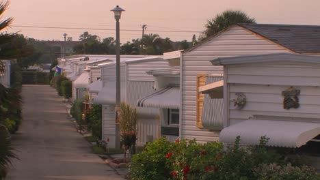 Rows-of-homes-near-a-walking-path-at-a-trailer-park